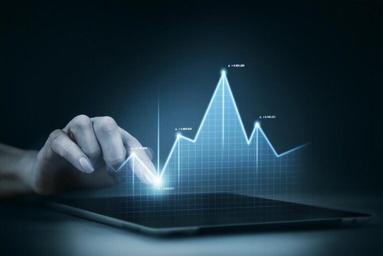 Tablet com gráficos azuis simbolizando a contabilidade digital.